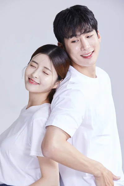 Korean Asian Young Couple Standing Back Back Studio Background — Stock Photo, Image