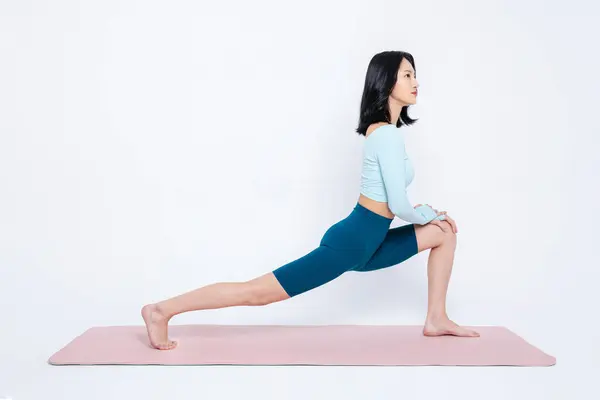 Woman Stretching Bare Body While Sitting Yoga Mat — Stock Photo, Image