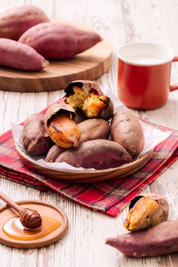 Warm sweet potatoes and winter themed plating clipart