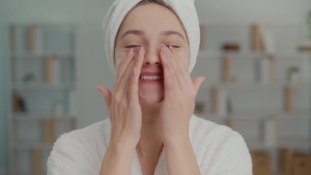 Portrait Smiling Young Woman Applying Moisturizing Cream Her Face Happy — Stock Video
