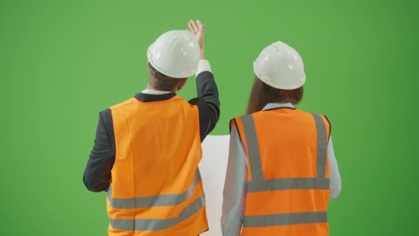 Green Screen Back View Young Male Female Civil Engineers Safety — Stock Video