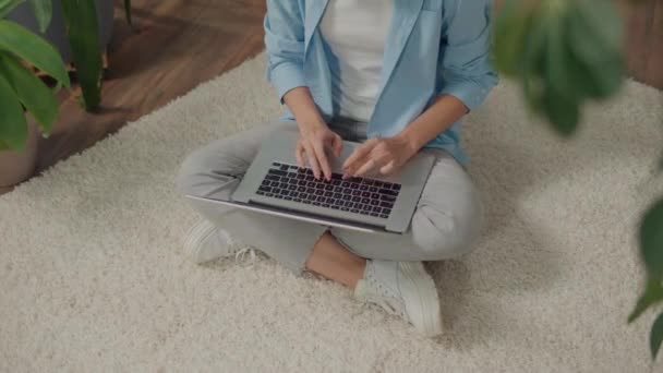 Smiling Young Woman Sitting Laptop Floor Flowers Plants Improve Mood — Stock Video