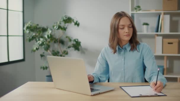 Successful Young Woman Writing Something While Working Computer Organization Workspace — Stock Video