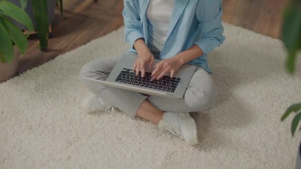 Smiling Young Woman Sitting Laptop Floor Flowers Plants Improve Mood — Stock Video