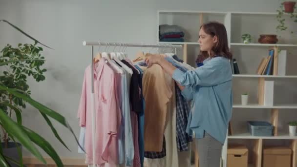 Beautiful Young Woman Cant Choose Wardrobe Home Work Studying Concentrated — Vídeo de Stock