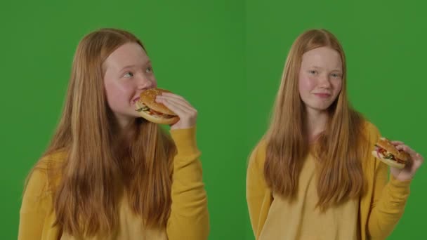 Split Green Screen Young Attractive Girl Enjoys Large Delicious Burger — Stock Video