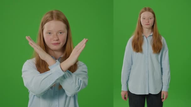 Splitgreen Pantalla Adolescente Muestra Firmemente Una Señal Stop Cruzando Sus — Vídeo de stock
