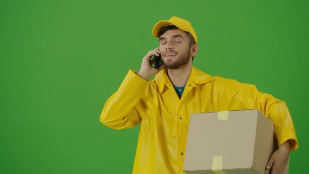 Green Screen Portrait Handsome Delivery Person Uniform Holds Cardboard Boxes — Stock Video