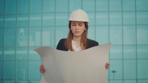 Portrait Successful Young Female Engineer Architect Wearing White Helmet Holding — Stock Video