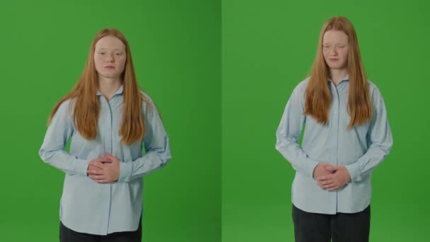スプリットグリーンスクリーン 少女は痛みで彼女のスタマを閉じ 不快感と苦痛を表現する 痛みか消化器の問題 医学および健康関連の内容のために適した — ストック動画