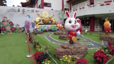 Kuala Lumpur, Malaysia - January 2023: Cute rabbit statues celebrating the Chinese New Year 2023 of rabbit zodiac sign in Thean Hou Temple. Buddhist temple dedicated to the Chinese sea goddess Mazu.