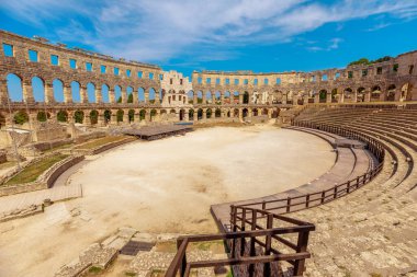 interior of Pula Amphitheater, Coliseum of Pula, well-preserved Roman amphitheater located in the Pula city , Istria, Croatia. This historic arena was constructed during 27 BC to 68 AD by Roman Empire
