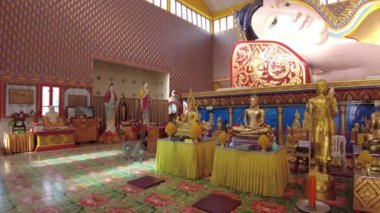 George Town, Malaysia - Jan 2023: The Wat Chaiya Mangalaram, a Thai Buddhist temple founded in 1845 by monks, is renowned for its reclining Buddha statue.