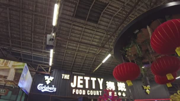 マレーシアのジョージタウン 1月2023 Chew Jettyのダイナミックで独特の文化を体験したい人は ストリートフードベンダーや地元のレストランを必ず訪れる必要があります — ストック動画