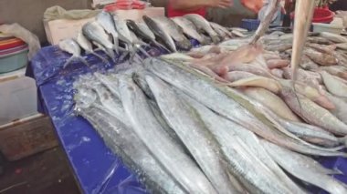 A wet market of Chow Kit Road Market in Kuala Lumpur, Malaysia. An extensive selection of items, from butchers and seafood vendors to fruits and seasonings, all at cost-effective prices.