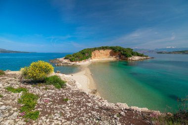 The Twin Islands of the Ksamil Archipelago are a pair of enchanting islands situated off the southern coast of Albania, near the popular tourist town of Ksamil. clipart