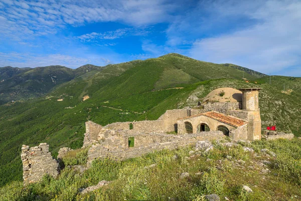 aerial view of Borsh Castle current ruins date back to 13th century. The castle is a popular tourist destination and offers stunning views of the surrounding area in Ionian Sea and Albanian Riviera.