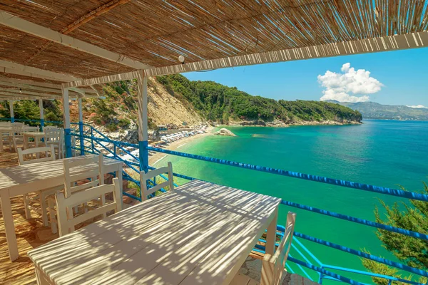 stock image Pulebardha beach offers a stunning aerial perspective. Situated near Saranda in Albania, this hidden gem boasts crystal-clear blue waters, a pristine pebbled shoreline, and breathtaking cliffs