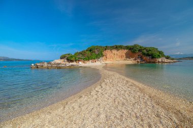 Twin Islands of the Ksamil Archipelago are characterized by their lush greenery, rocky landscapes, and idyllic beaches with soft sands and crystal-clear waters. clipart