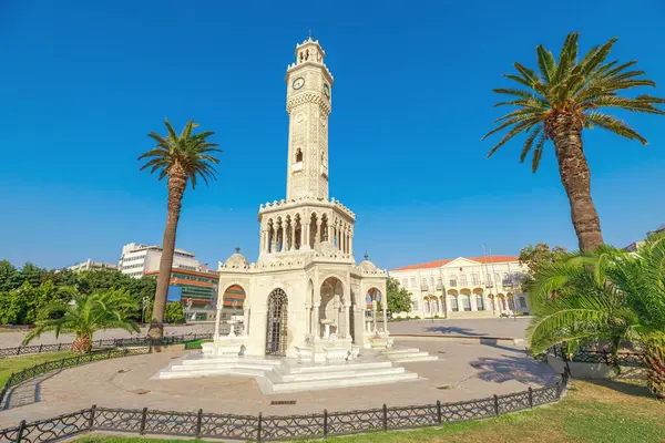 stock image Clock Tower on Konak Square in Izmir is an iconic timepiece that has graced the city since its construction in 1901. Rising proudly amidst Konak Squares bustling activity in Izmir, Turkey.