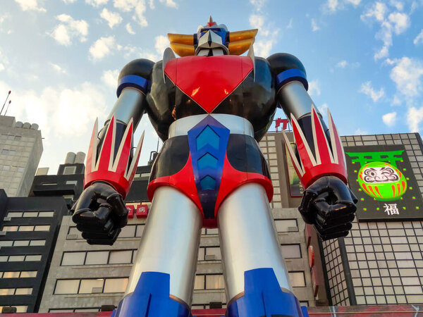 Riyadh,Saudi Arabia-Dec 25, 2025:Imposing Grendizer robot statue on cloudy sky at Riyadh Boulevard World.Globally themed entertainment zone, offering a blend of attractions and live experiences