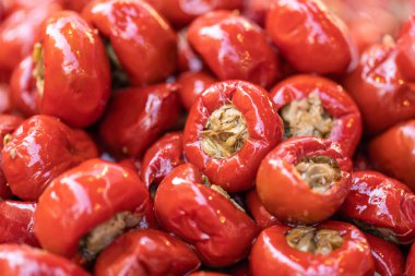 Stuffed cherry peppers marinated closeup, food background, organic food, vegetarian. Spicy food. Selective focus. High quality photo