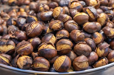 Roasted sweet chestnuts close up. Food background. Healthy eating. Organic food. Healthy lifestyle. Protein source. View from above. High quality photo