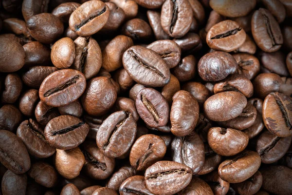 Close Roasted Coffee Beans Background Texture Good Mood Coffee Aroma lizenzfreie Stockfotos