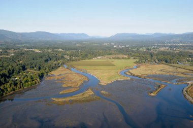 Aerial photograph of farmland in the Cowichan River estuary, Vancouver Island, British Columbia, Canada. clipart