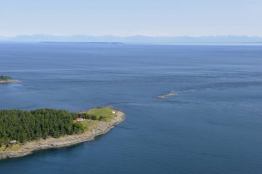 East Point Lighthouse, Gulf Islands National Park Reserve of Canada, Saturna Island, British Columbia, Canada. clipart