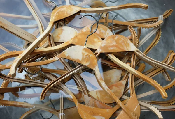 stock image close up a Wooden hooks for hanging lots of clothes in the washing basin. Cleaning concept.