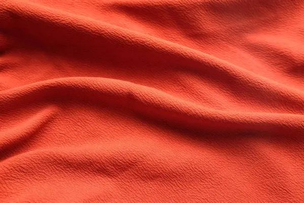 Sfondo Arancio Tessuto Texture Tessuto Stropicciato Ondulato Tessuto Superficie Liscia — Foto Stock