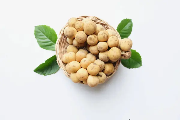 stock image copy space fresh organic (lansium domesticum corr. ) Longkong langsat fruit with leaf on white background . tropical fruit in thailand.healthy fruit