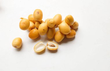 Palmiye ağaçlarının meyveleri... Dactylifera ya da salkımlı hurma ağaçları...