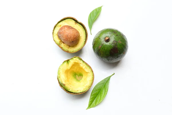 Whole, fresh, half and sliced avocados  with leaf and zest isolated on white backdrop. avocado fruits healthy lifestyle.Vegetarian food. Vegan menu.