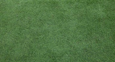 Üst ve düz bir çim dokusu, yaz bahçesi şablonu, gerçekçi çimen arka planı, taze çimen halısı, arkaplan için yeşil alan duvar kağıdı ve ağ tasarımı ya da reklam ağları için boş alan