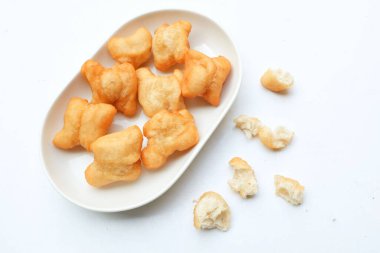 Bol yağda kızartılmış hamur çubuğu, kızarmış hamur (Padongo) kahvaltısı ya da geleneksel Tayland hamur çubuğunun üzerinde Çin çöreği çubukları Tayland 'da genel olarak kahvaltıdır. Tayland sokak yemekleri