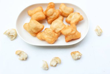 Bol yağda kızartılmış hamur çubuğu, kızarmış hamur (Padongo) kahvaltısı ya da geleneksel Tayland hamur çubuğunun üzerinde Çin çöreği çubukları Tayland 'da genel olarak kahvaltıdır. Tayland sokak yemekleri