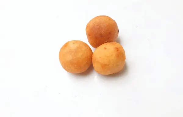 stock image Thai Deep Fried  Sweet Potato Balls or (Khanom khai nok kratha) isolate on a white backdrop.is a Thai snack. The sweet is a fried sweet potato dough ball