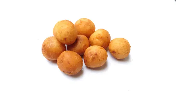 stock image Thai Deep Fried  Sweet Potato Balls or (Khanom khai nok kratha) isolate on a white backdrop.is a Thai snack. The sweet is a fried sweet potato dough ball