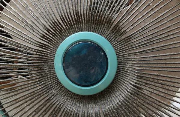 Stock image close up dirty and dust on floor fan , fan blades. impact on the air, allergies to health,unhealthy air flow for respiratory system. cleaning and hygiene care concepts