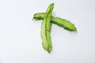 fresh raw green Winged bean, (Psophocarpus tetragonolobus) isolate on a white backdrop. vegetables 