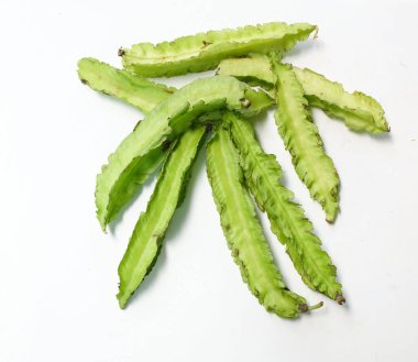 fresh raw green Winged bean, (Psophocarpus tetragonolobus) isolate on a white backdrop. vegetables 