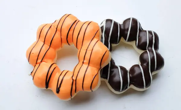 stock image set of colorful donuts,collection of donut image. various types of donuts in glaze and chocolate,milk, thai tea, green tea, isolate on a white backdrop