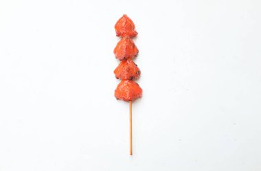 delicious ,Juicy Chicken butt grilled isolated on white backdrop. BBQ chicken butt. Grilled chicken butt skewer. Halal food. Traditional street food in Thailand