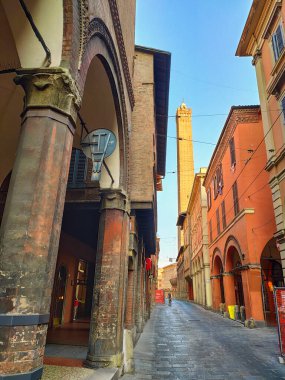 Garisenda tower seen from Maggiore street, Bologna city, Emilia Romagna, Italy clipart