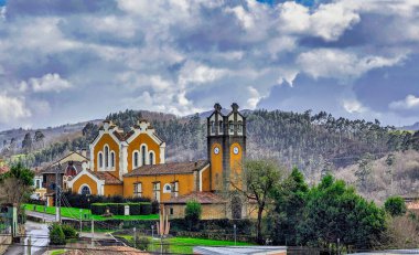 San Felix de Valdesoto church is in Valdeosto village, Siero, Asturias, Spain clipart