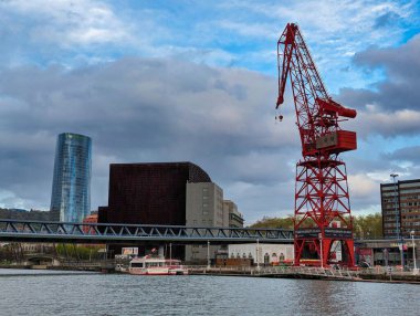 Bilbao, Spain; march 27th 2024: the crane named La Carola, is a left over from the areas industrial past and other buildings as
