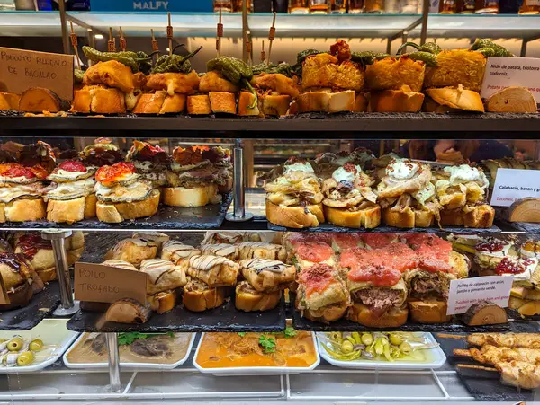 Pintxos displayed in the display case of a restaurant in Laguardia city, Alava, Spain