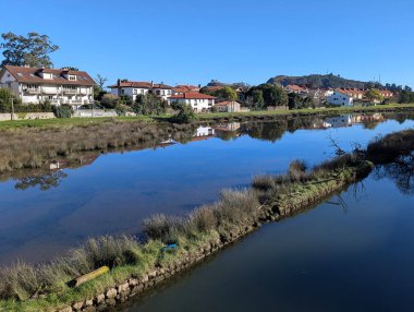 Houses and Ribadesella stuary, Asturias, Spain clipart